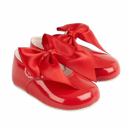Red patent bow shoes