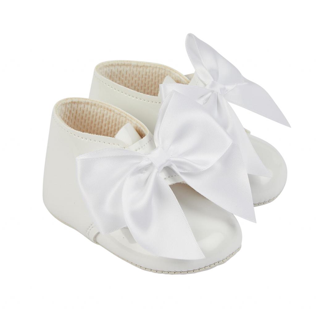 White patent girls bow boots